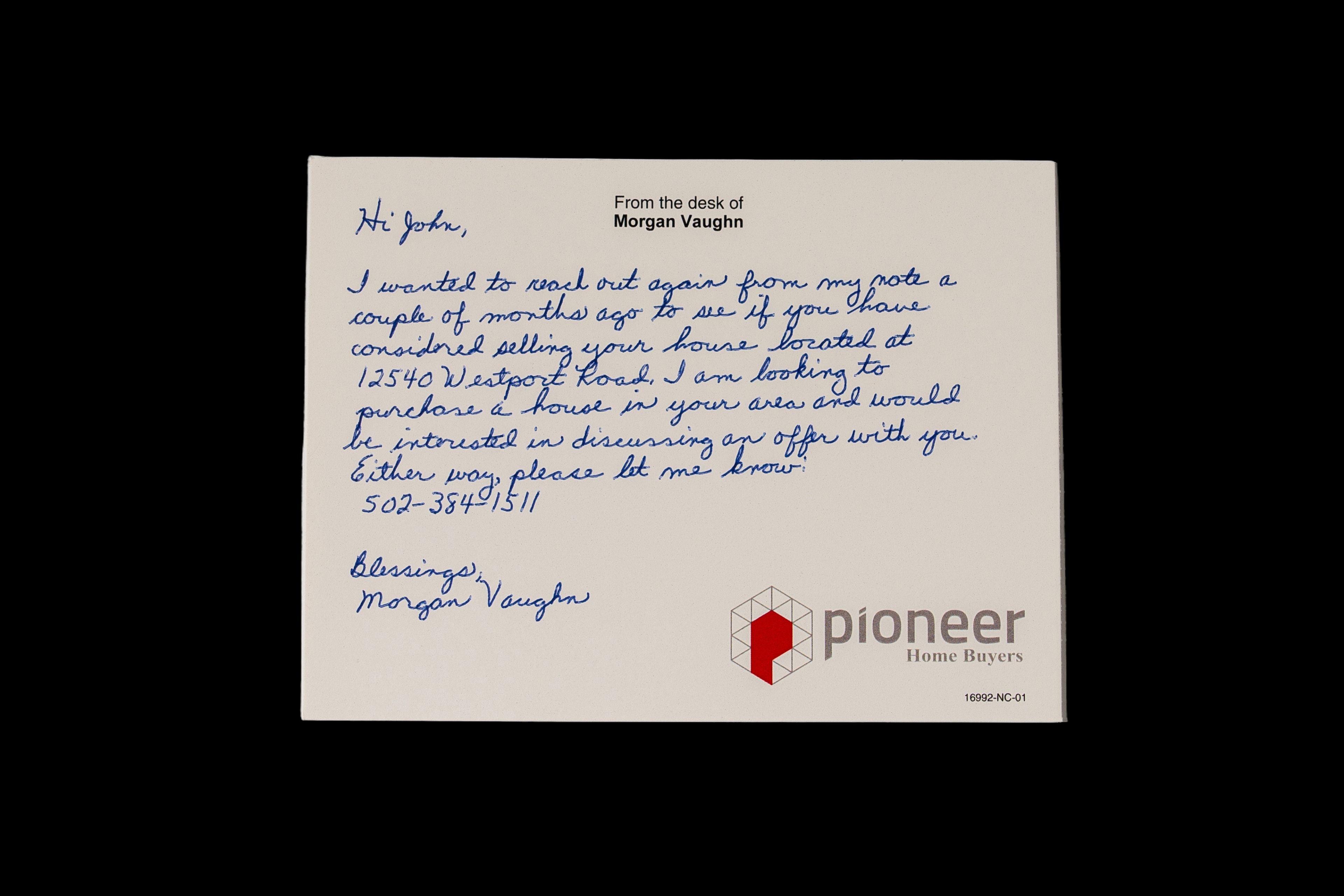 A personalized note with blue handwriting and a handwritten signature